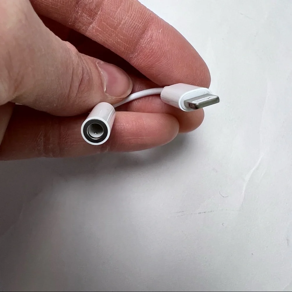 Never Used - Apple Adapter - 3.5mm headphone jack to lightning port adapter